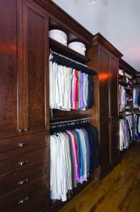 CUSTOM BEDROOM CLOSET WITH CUSTOM DOORS AND DRAWERS