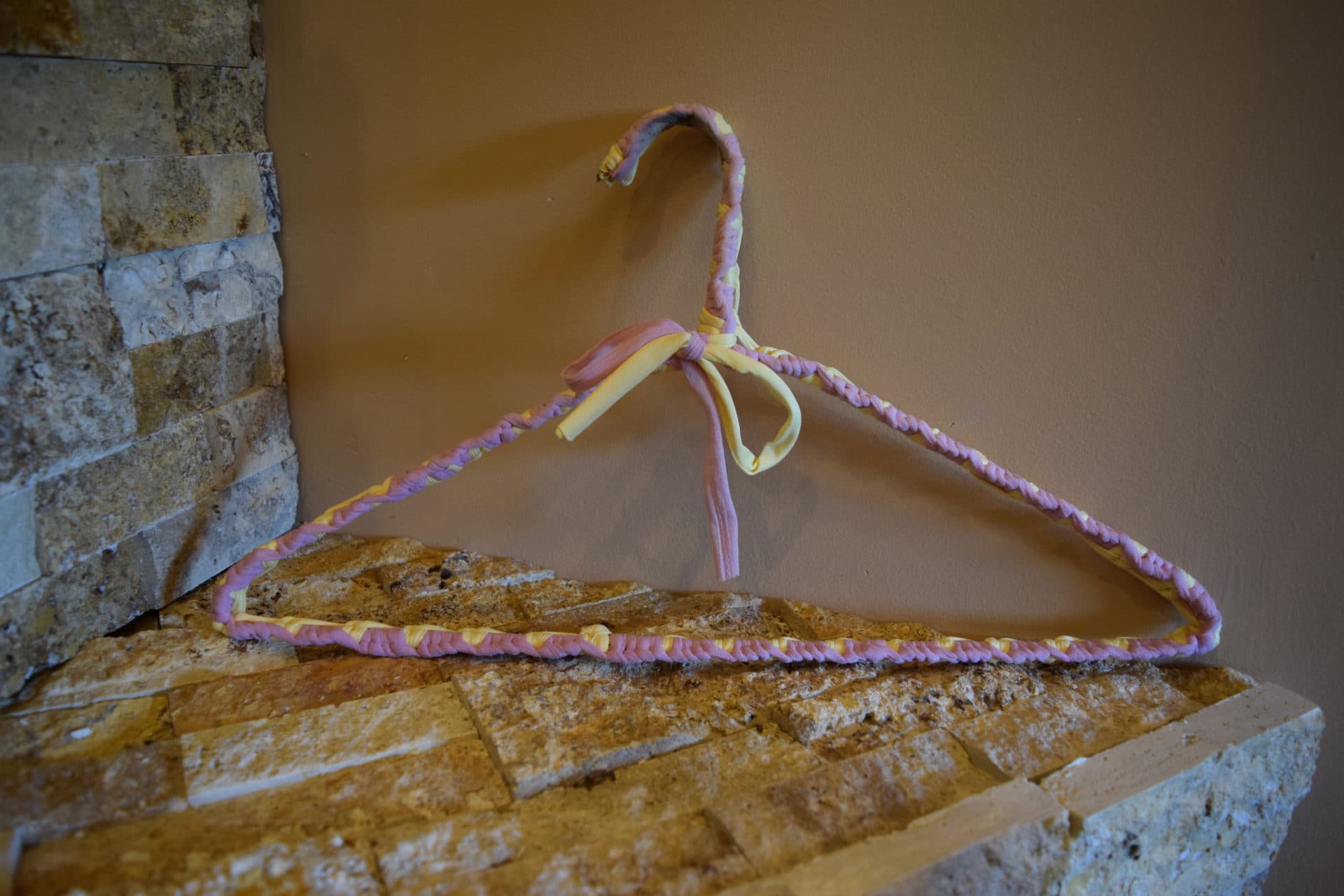 Gina's favorite hanger wrapped in lavendar and yellow material