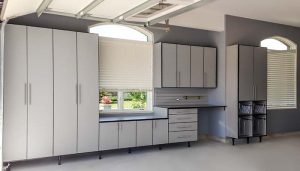 CUSTOM GRAY SUSPENDED GARAGE CABINETRY WITH BLACK EDGEBANDING