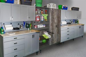 MULTIPLE WORK BENCHES WITH RUSTIC GARAGE STORAGE CABINET