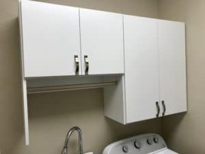 CUSTOM LAUNDRY ROOM CABINETS WITH HANGING BAR