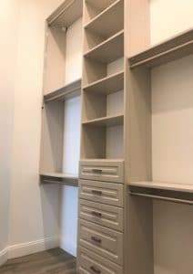HERS CUSTOM CLOSET WITH MULTIPLE HANGING SECTIONS