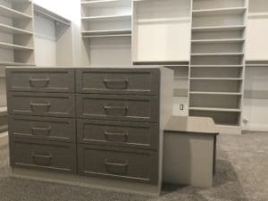 CUSTOM CLOSET ISLAND DRAWERS WITH INTEGRATED BENCH
